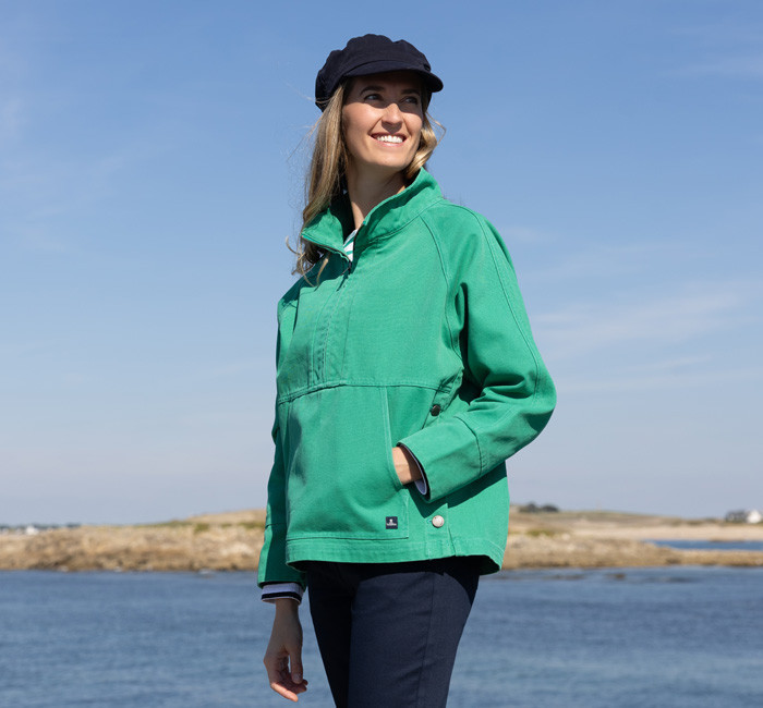 Woman wearing a yellow fisherman smock