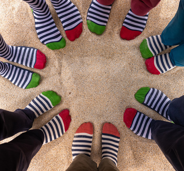 Striped socks in the sand