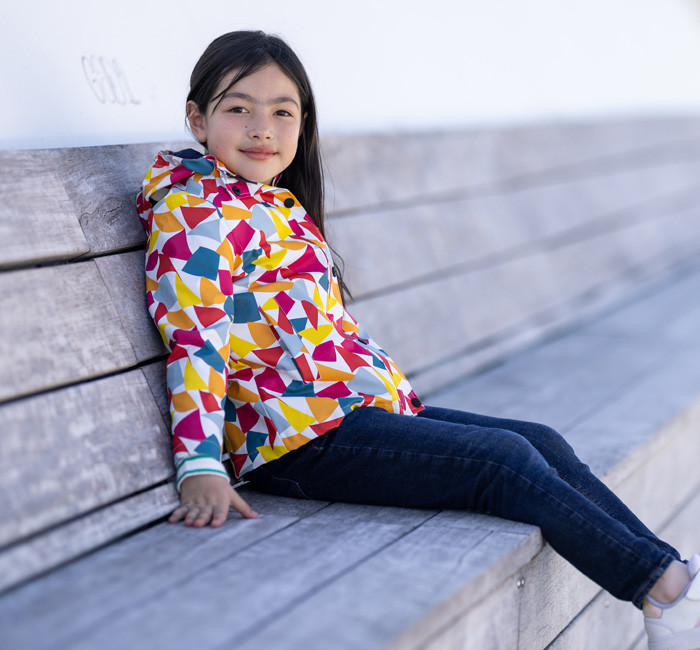 Children wearing sailor-inspired outfits